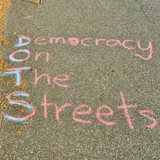 Democracy On The Streets. Blue Chalk. Example.