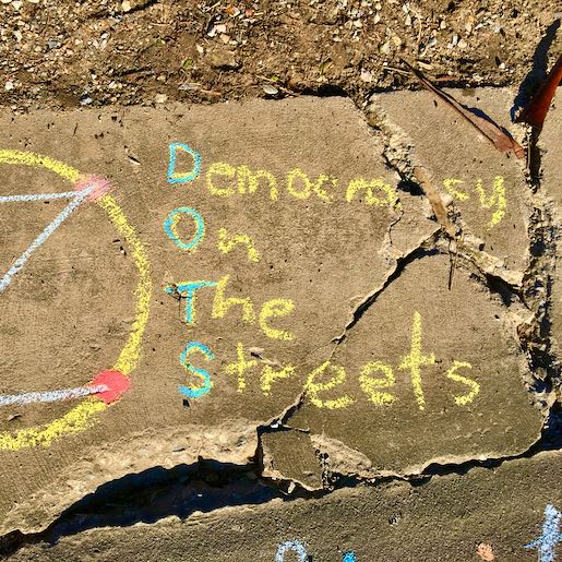 Democracy On The Streets. Gutter. Chalk.