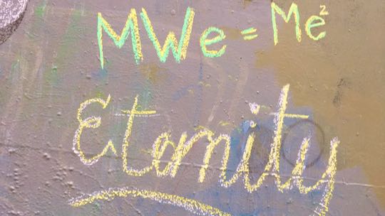 Example: Eternity DOTS and 'MWe=Me2" written in chalk on wall